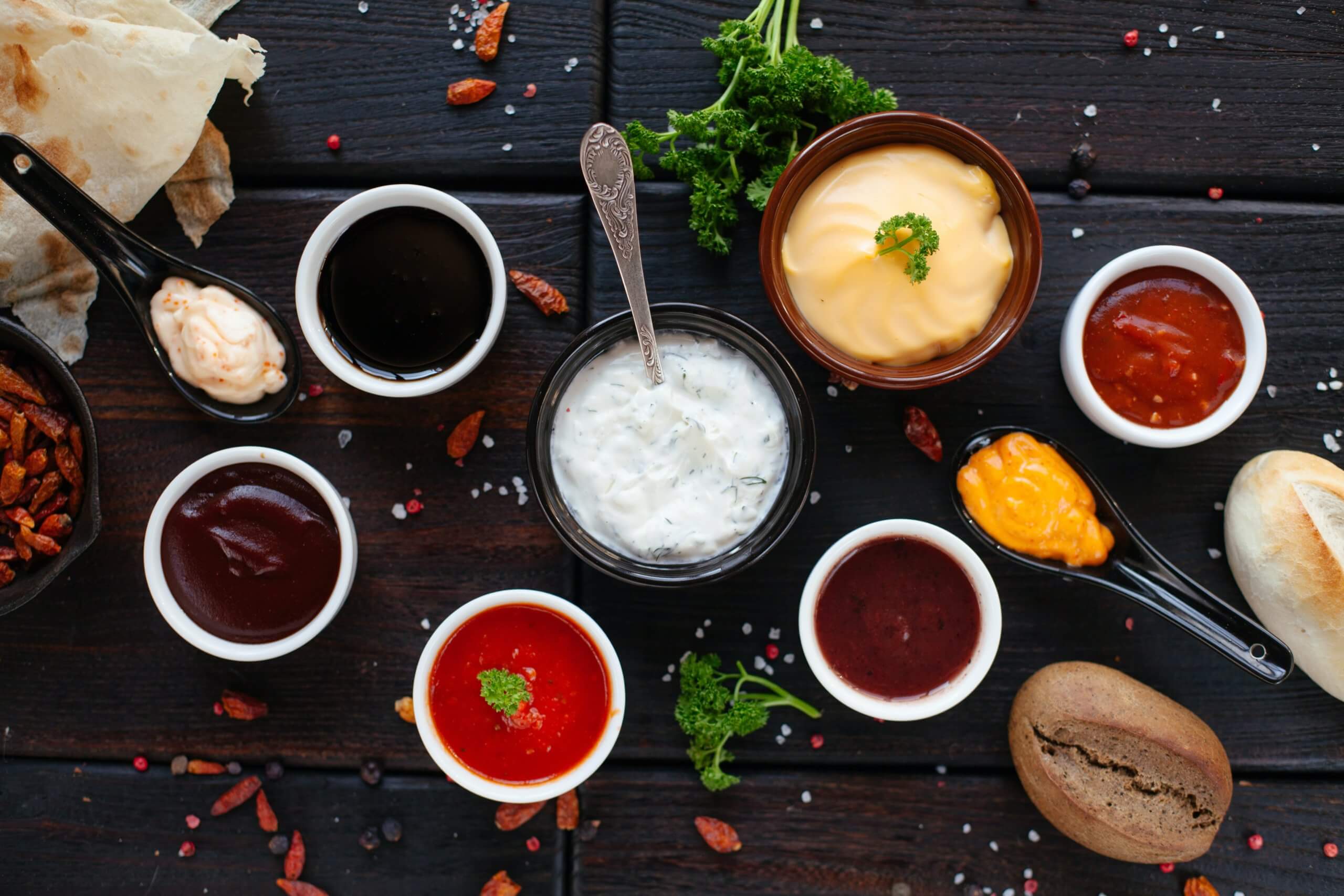 a selection of sauces on a table