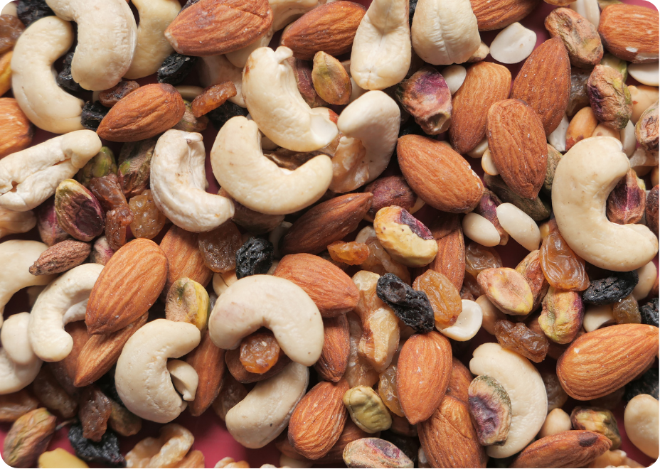 a picture of mixed nuts - almonds, cashews, peanuts, pistachios