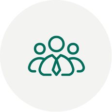 Green outline of three people standing together, representing a team, on light grey background.